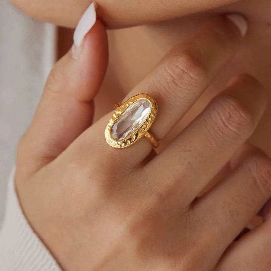 Alma Gold Oval Ring on the hand, worn