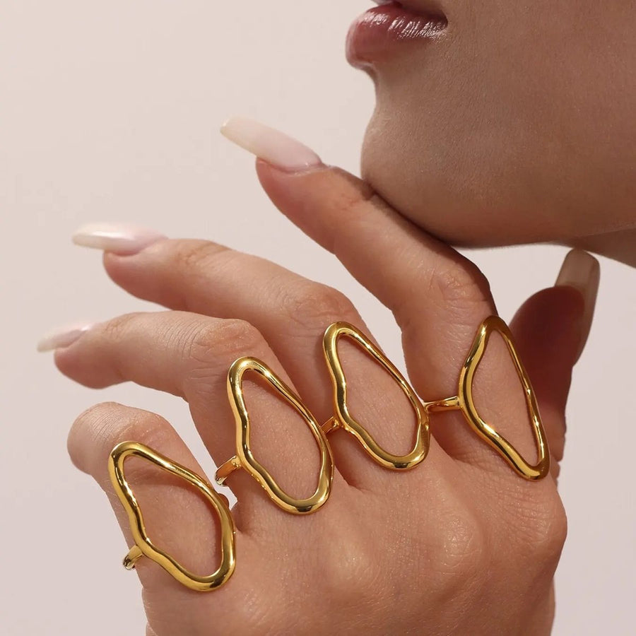 Contour Line Gold Stacking Ring on the hand, worn