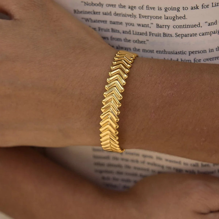 Épi Wheat Gold Cuff Bracelet on the wrist, worn