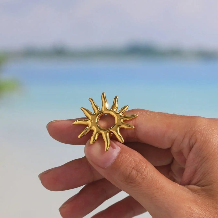 Helia Gold Sun Ring on the hand, worn
