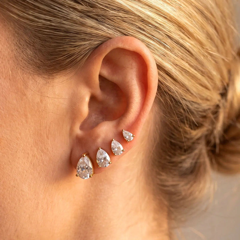 Earrings, worn