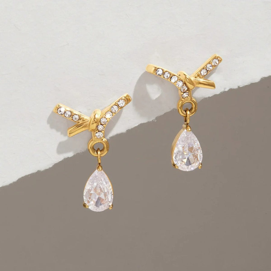 Noor Crossover Gold Teardrop Earrings, close-up detail