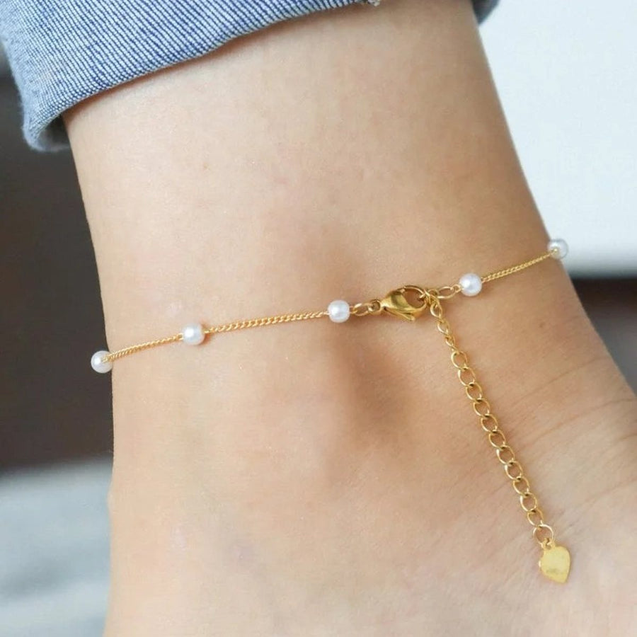 Seaside Gold Pearl Anklet on the ankle, worn