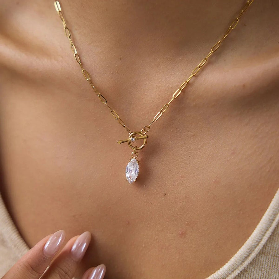 Toggle Marquise Gold Paperclip Necklace on the neckline, worn
