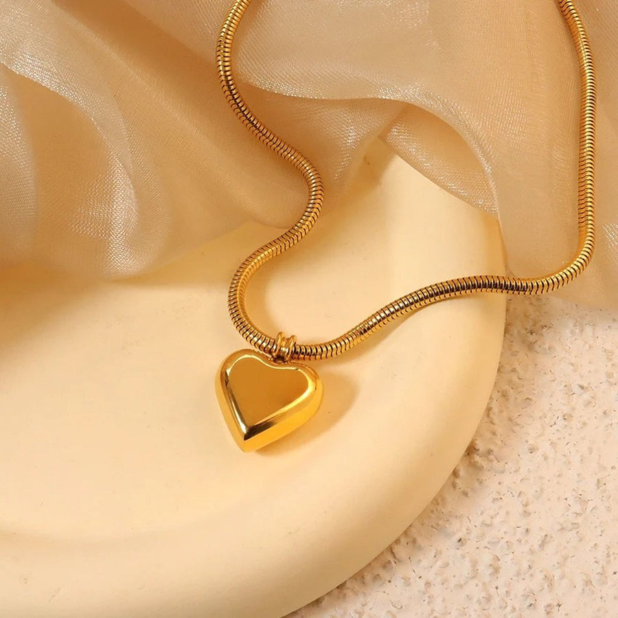 Amara Heart Necklace, heart necklace, flat lay