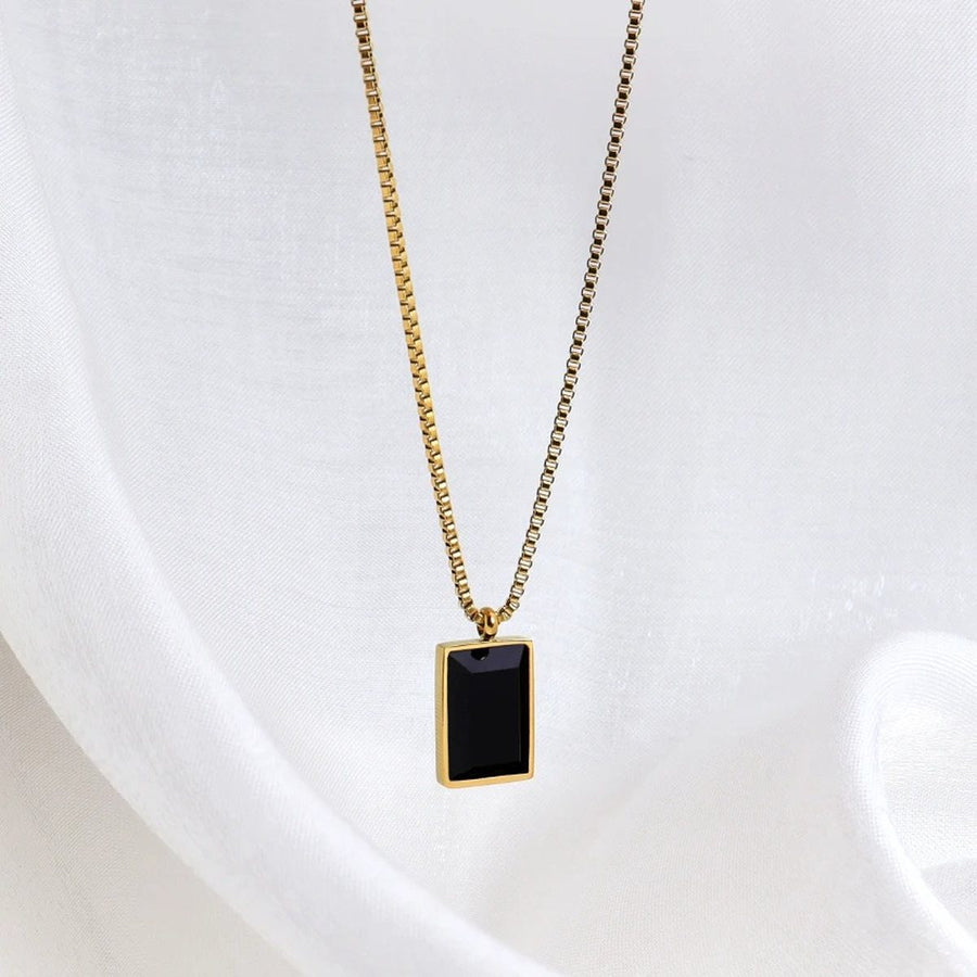 Ébène Square Gold Pendant Necklace, black enamel rectangle pendant on a gold box chain