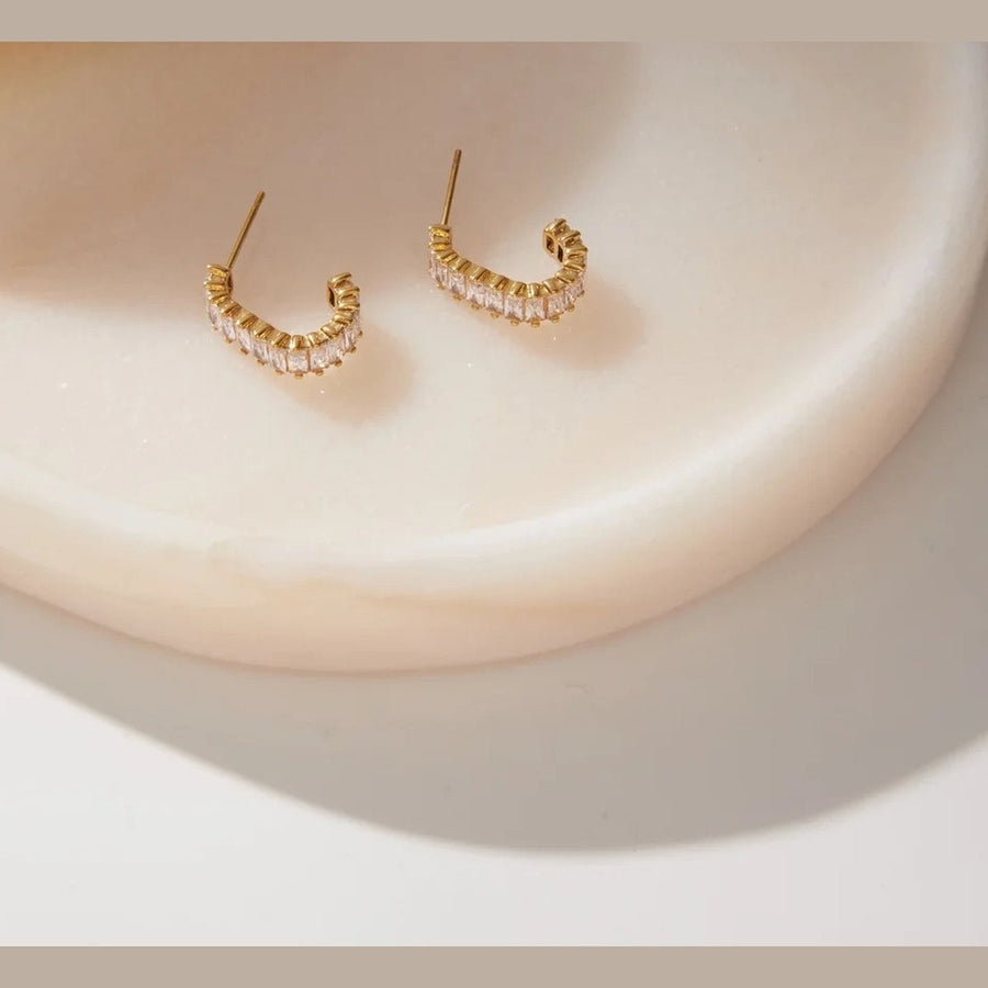 Elle Baguette Huggies, huggie earring, flat lay