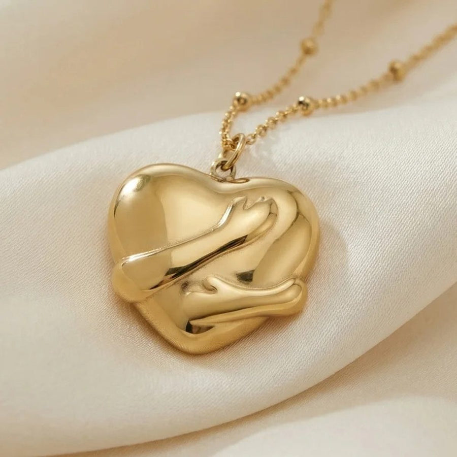 Embrace Gold Heart Necklace, close-up detail
