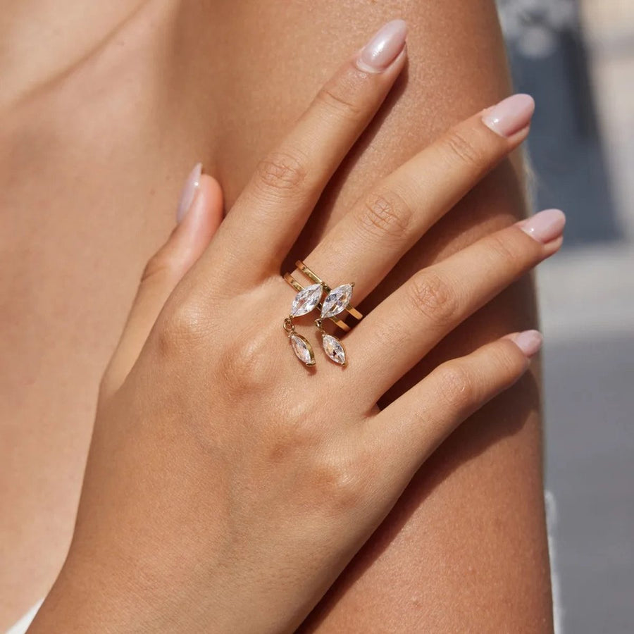 Gisele Gold Drop Ring on the hand, worn