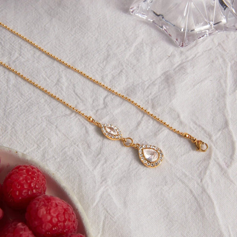 Halo Teardrop Pendant, pendant necklace, flat lay
