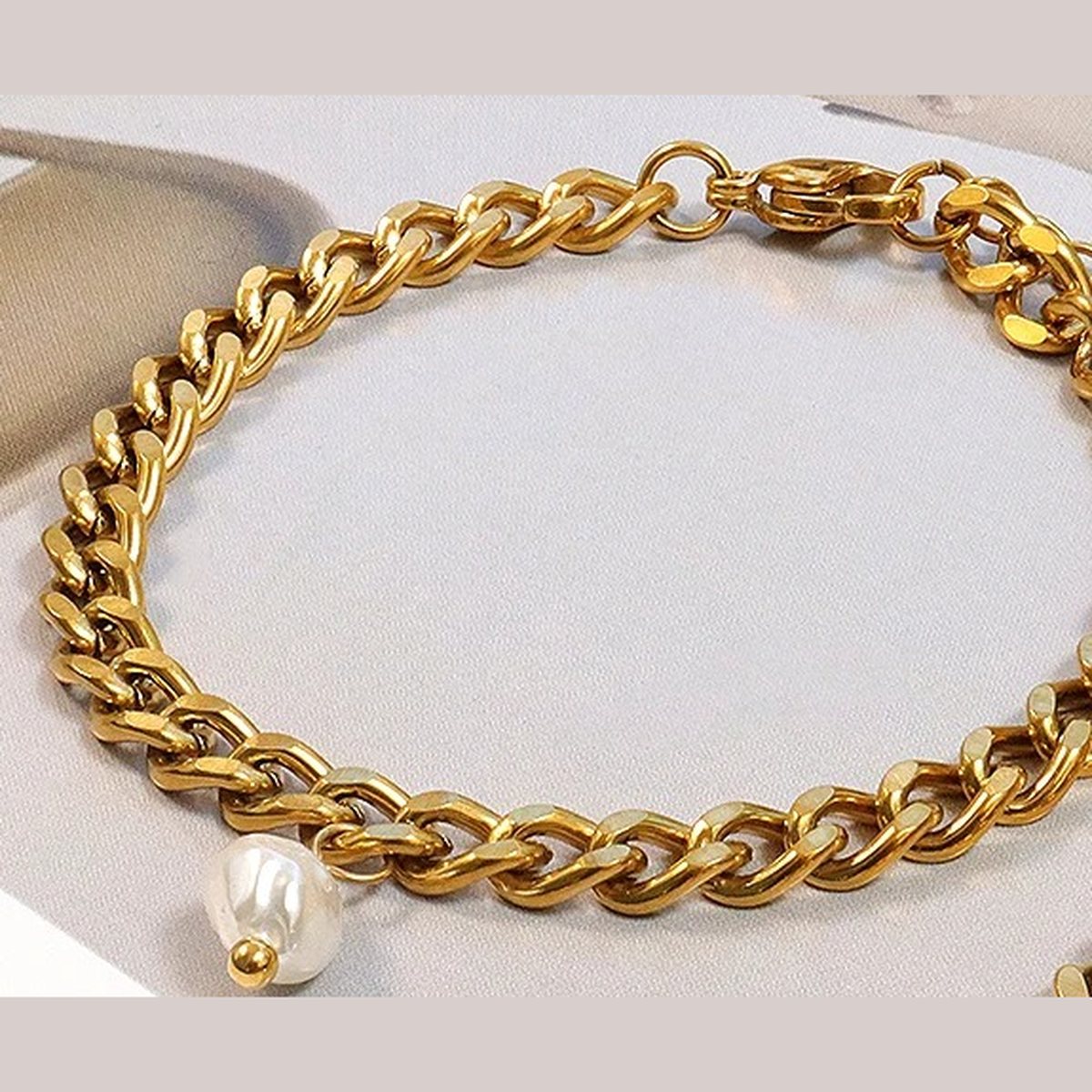 Isabeau Pearl Curb Bracelet, chain bracelet, flat lay