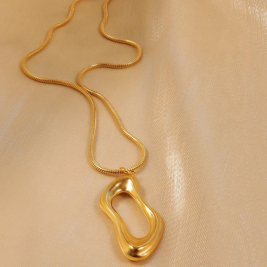 Isola Molten Pendant, pendant necklace, flat lay