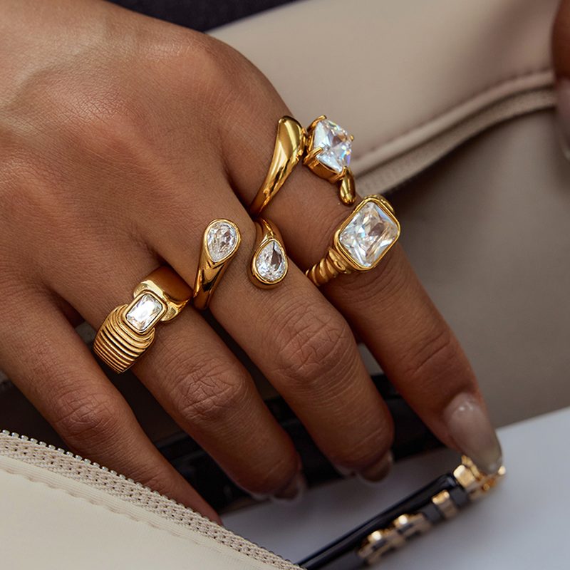 Kora Gold Teardrop Ring, open gold ring with two stone-set teardrops