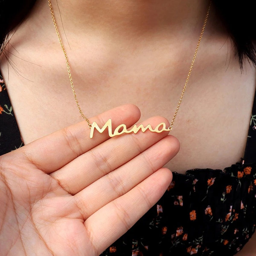Mama Script Gold Chain Necklace on the neckline, worn
