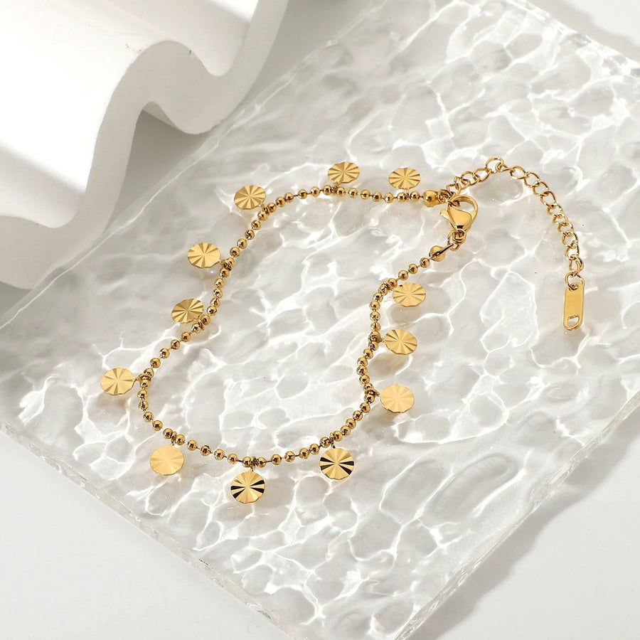 Marigold Disc Anklet, charm anklet, flat lay