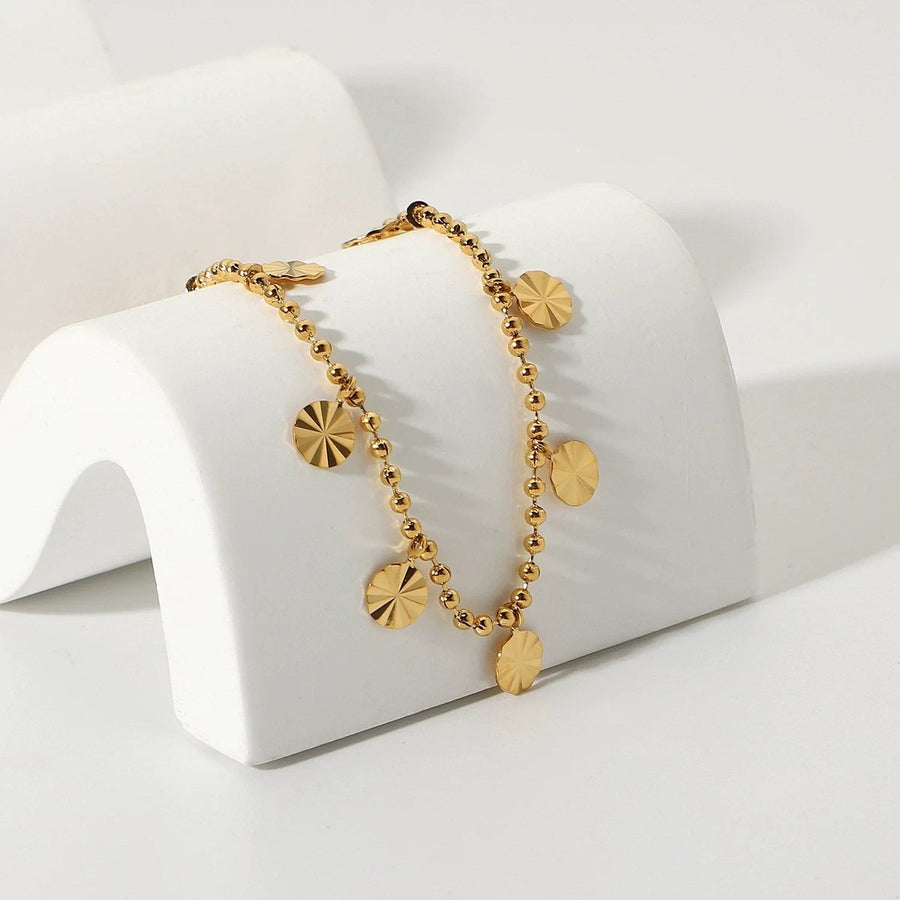 Marigold Disc Anklet, charm anklet, flat lay