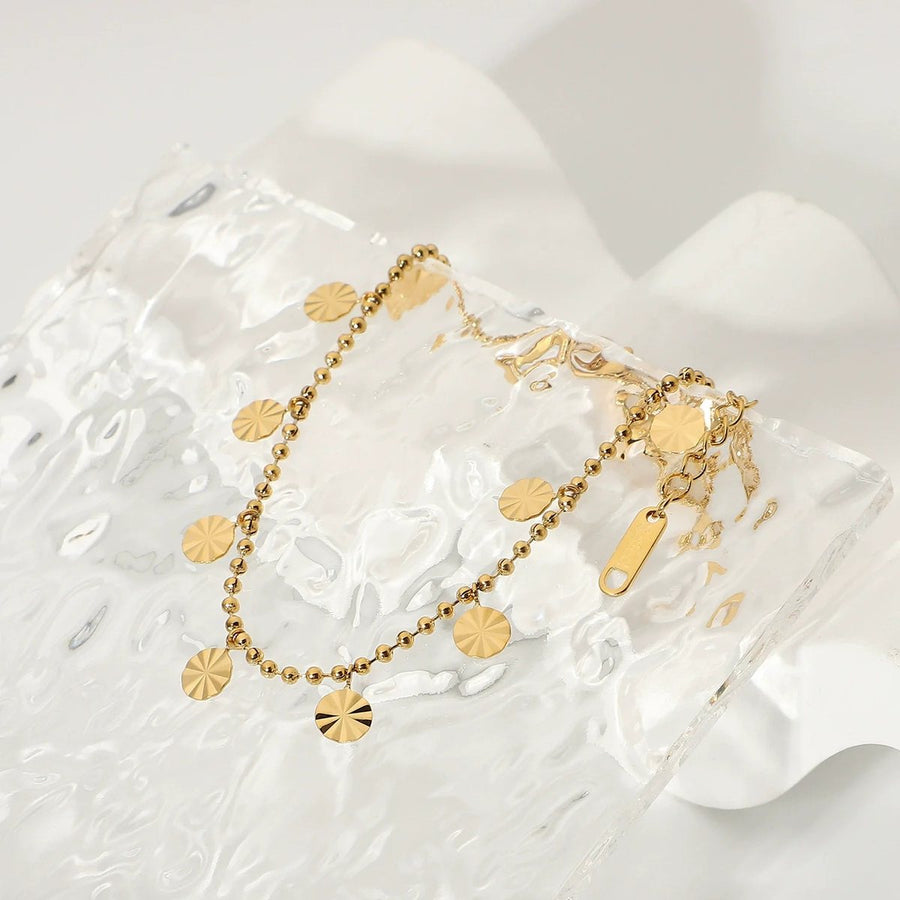 Marigold Disc Anklet, charm anklet, flat lay