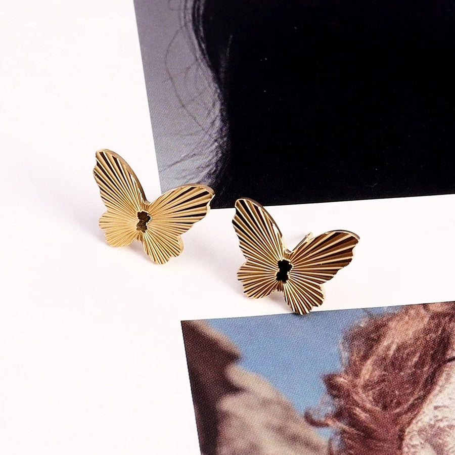 Monarch Butterfly Gold Stud Earrings, flat lay