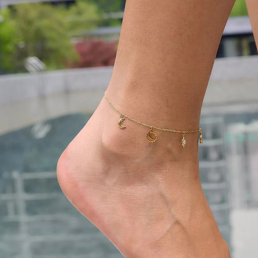 Riviera Star Gold Charm Anklet on the ankle, worn