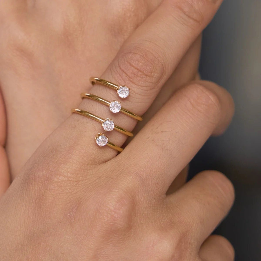 Rosette Crystal Gold Ring on the hand, worn