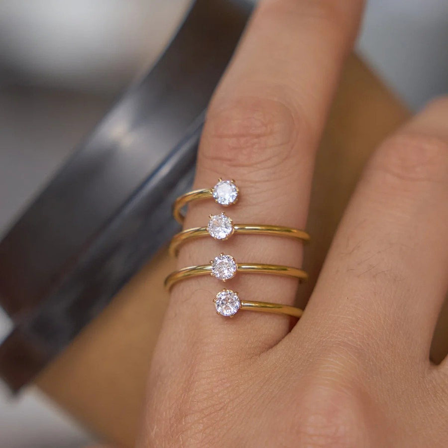 Rosette Crystal Gold Ring on the hand, worn