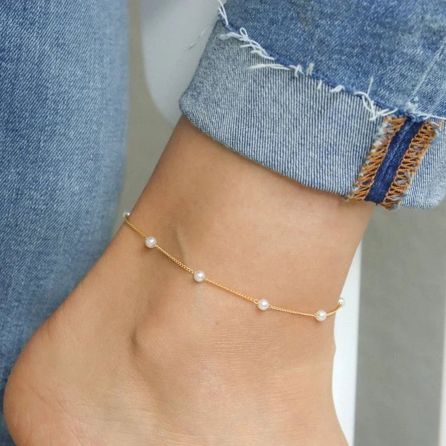 Seaside Gold Pearl Anklet on the ankle, worn