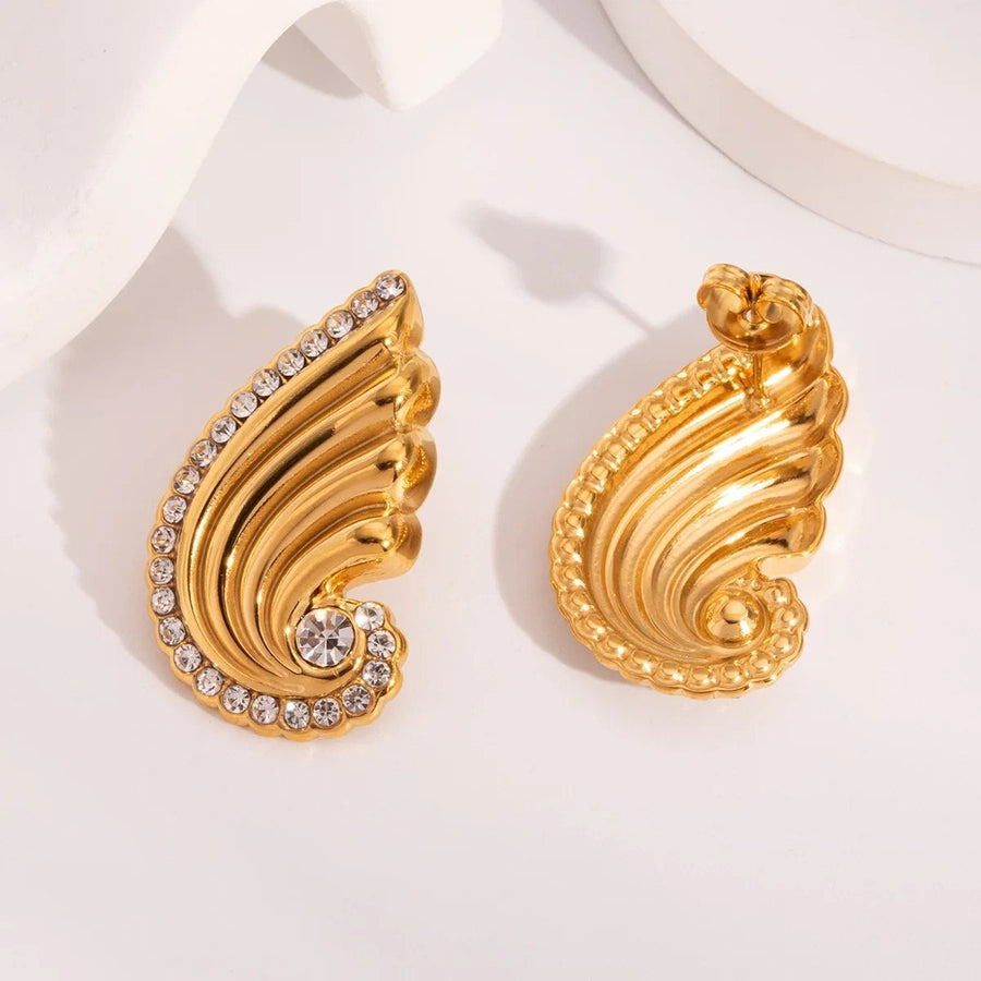 Seraphine Wing Studs, stud earring, flat lay